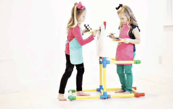 Two girls building with Petra Play Ultimate Builder Set, 220 pieces, creative construction toy.
