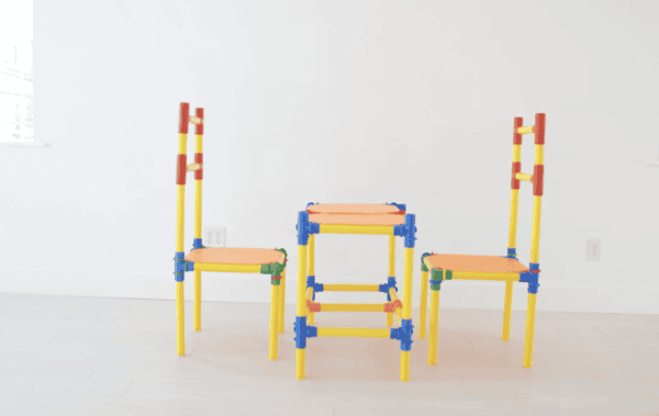 Versatile PetraPlay construction set with colorful sticks and connectors for creative building.