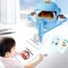 Interactive drawing robot for kids with 100 learning cards for creative education.