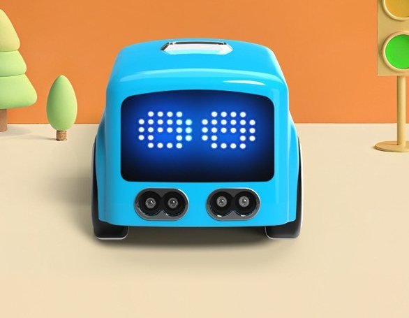 Front view of the blue mini bus with its LED eyes lit