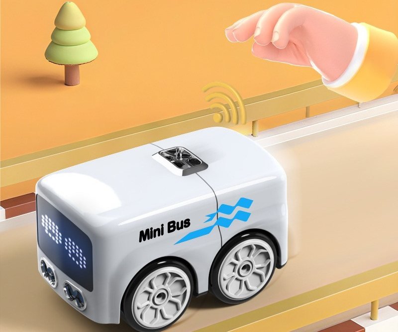 Hand reaching towards the mini bus as it drives away