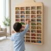 Wooden Toy Car Wall Shelf, 50 Spots: Personalised: hero A child reaching for a toy car on the wooden wall shelf