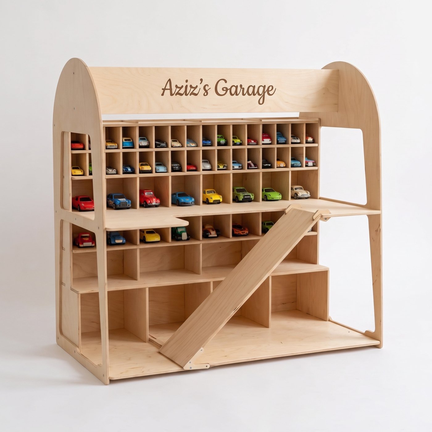 The assembled wooden toy car garage on a white background