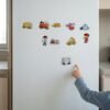 Transport & Occupations Magnets: a child placing a piece Transport & Occupations Magnets: a child placing a piece